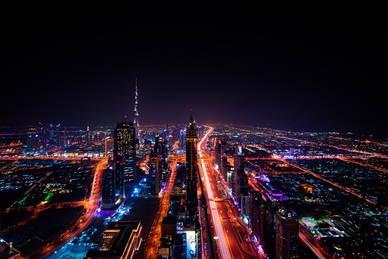 Downtown Dubai skyline at night with the Burj Khalifa